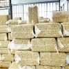 Stacked blocks of vacuum-packed W180 cashews ready for international shipping from Vietnam.