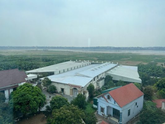 The exterior of the modern Banaco processing facility in Phu Tho, designed for large-scale agricultural exports.