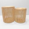 Premium handwoven cylindrical natural rattan storage baskets.