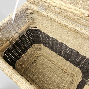 A close-up view of the interior of a seagrass basket, revealing the exquisite hand-weaving techniques, even stitches, and incredibly sturdy structure crafted by Northern Vietnamese artisans.