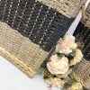 The perfect harmony between the natural golden color of seagrass and a bold black stripe, delivering a contemporary look to traditional Vietnamese handicrafts.