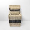 A complete set of seagrass baskets neatly nested together to optimize international shipping space. The practical lidded design is a smart storage solution highly favored by B2B partners.