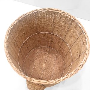Spacious rattan basket interior with sturdy metal frame]